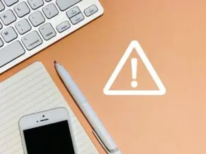 墓じまいの注意点を示す警告マークのイメージ
